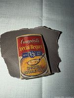 Front view of Campbell’s Special Request Chicken Noodle Soup label pin