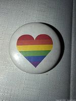 front view showing rainbow heart graphic on white background