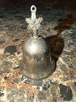 Front view showing engraving and tarnish