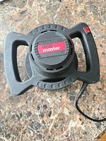 Top view showing Drill Master branding and handle design