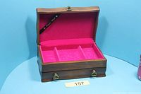 jewellery box open showing top compartment pink felt