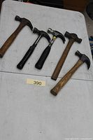 All five hammers laid out on table
