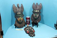 Group shot of three masks showing relative sizes