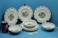 Full lot showing plates, bowls and size reference