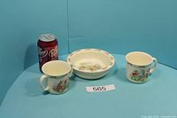 Bowl and both cups together with soda can for scale