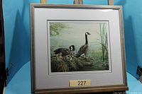 Full view of framed print with frame and mat visible