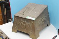 Front and top view of embossed metal coal shuttle