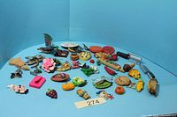 Group view of entire assortment of magnets on blue background