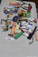 Full view of entire lot of sewing supplies spread on table
