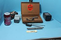 overall lot showing micrometer in case, two slide viewers, clamp, rods, slotted bar