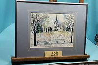 Full view of framed print on easel