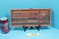 Full view of closed Powermaster set beside can for scale