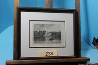 Framed engraving showing full frame and mat