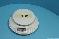 Top view of white Weight Watchers digital kitchen scale showing LCD display and buttons