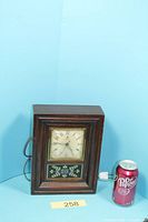 Entire clock front with soda can for scale