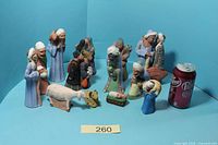 Full set of terracotta nativity figures with soda can for scale