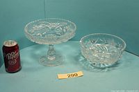 Compote and footed bowl with soda can for scale