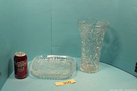 Vase and dish together for scale with can