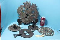 Group shot of all five metal items with soda can for scale