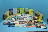 All postcard booklets displayed upright and flat