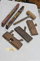 Overall lot with two levels, mallet, three planes