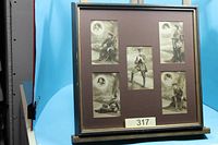 Full view of framed postcards