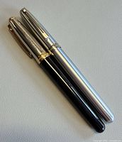 Two closed Sheaffer pens side by side