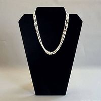 Necklace displayed on bust