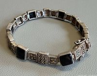 Top view of entire bracelet showing link pattern and clasp
