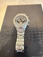 Front view of Ice Star crystal-accented wristwatch on display surface