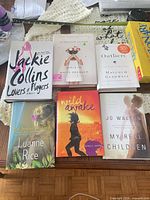 All six hardcover books front covers visible
