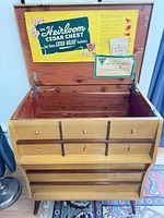 Front and interior view of open cedar hope chest