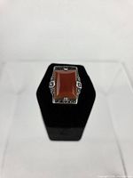 Front view of sterling ring showing carnelian cabochon and marcasite frame