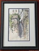 Full view of framed watercolor showing subject, mat and frame