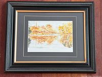 Full view of framed watercolour painting showing subject, matting and frame