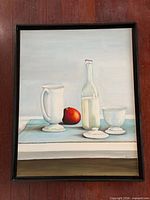 Full view of framed still life painting