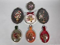 Full group shot of seven wall art pieces