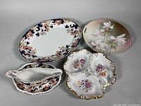 Group view of all five porcelain pieces