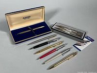 Group shot showing all boxed and loose pens