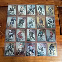 Full set of 20 autographed cards in protectors