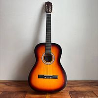 Front view of Stiller classical guitar on floor