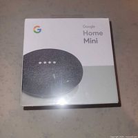Front of sealed Google Home Mini retail box