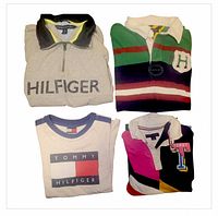 Group shot of all four folded Tommy Hilfiger tops