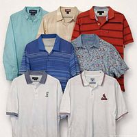 Group shot of all seven men’s Large shirts laid out together