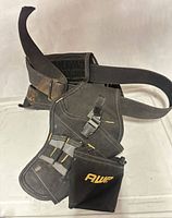 Front view of AWP tool belt showing primary pouch, smaller accessory pocket and embroidered logo