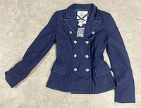 Front of navy double-breasted B.B. Dakota peacoat showing buttons, collar, pockets, tag attached