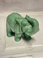 Front three-quarter view showing overall form and carving detail