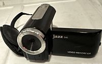 Front and side view of Jazz Z40 camcorder showing lens, flip-out screen and branding