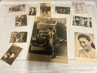 Overview of all 11 vintage photographs on white surface