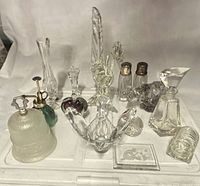 Full lot showing all glass and crystal pieces grouped together
